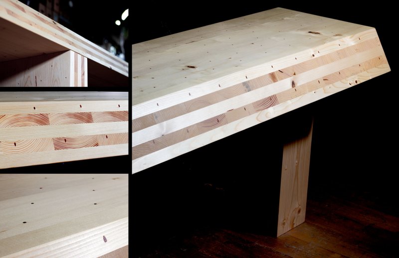 Bild des Massivholztischs mit sichtbaren Holznägeln, die Aluminiumnägel und Holzdübel ersetzen (Bild: Beck).