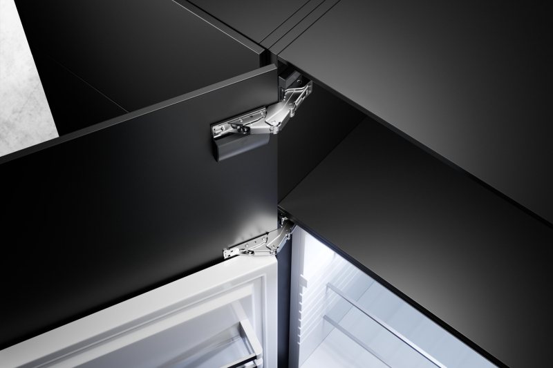 Das Führungsscharnier sorgt für die nötige Stabilität in der Drehbewegung der Möbeltür. Dadurch bleibt das Fugenbild perfekt (Bild: Hettich).